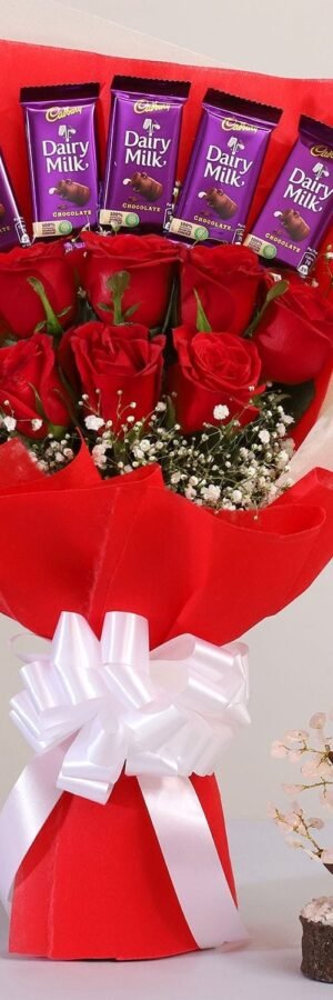 Bunch of red roses with chocolates