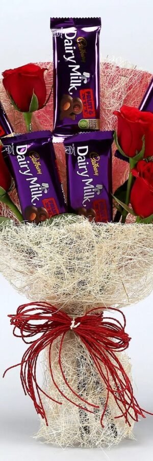 Red roses bouquet with fruit and Nut in a Jute